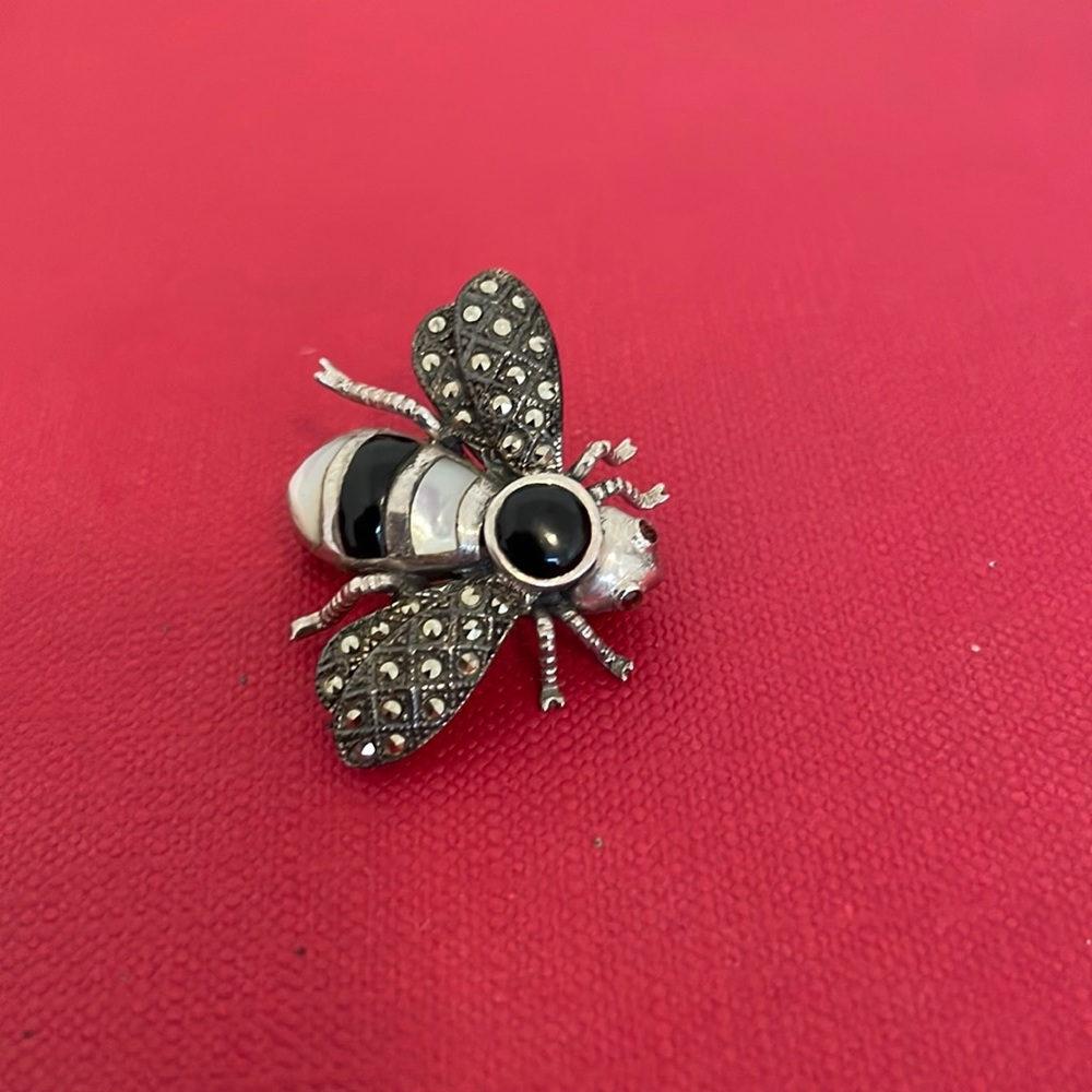 Sterling silver bumble bee with open wing black onyx brooch